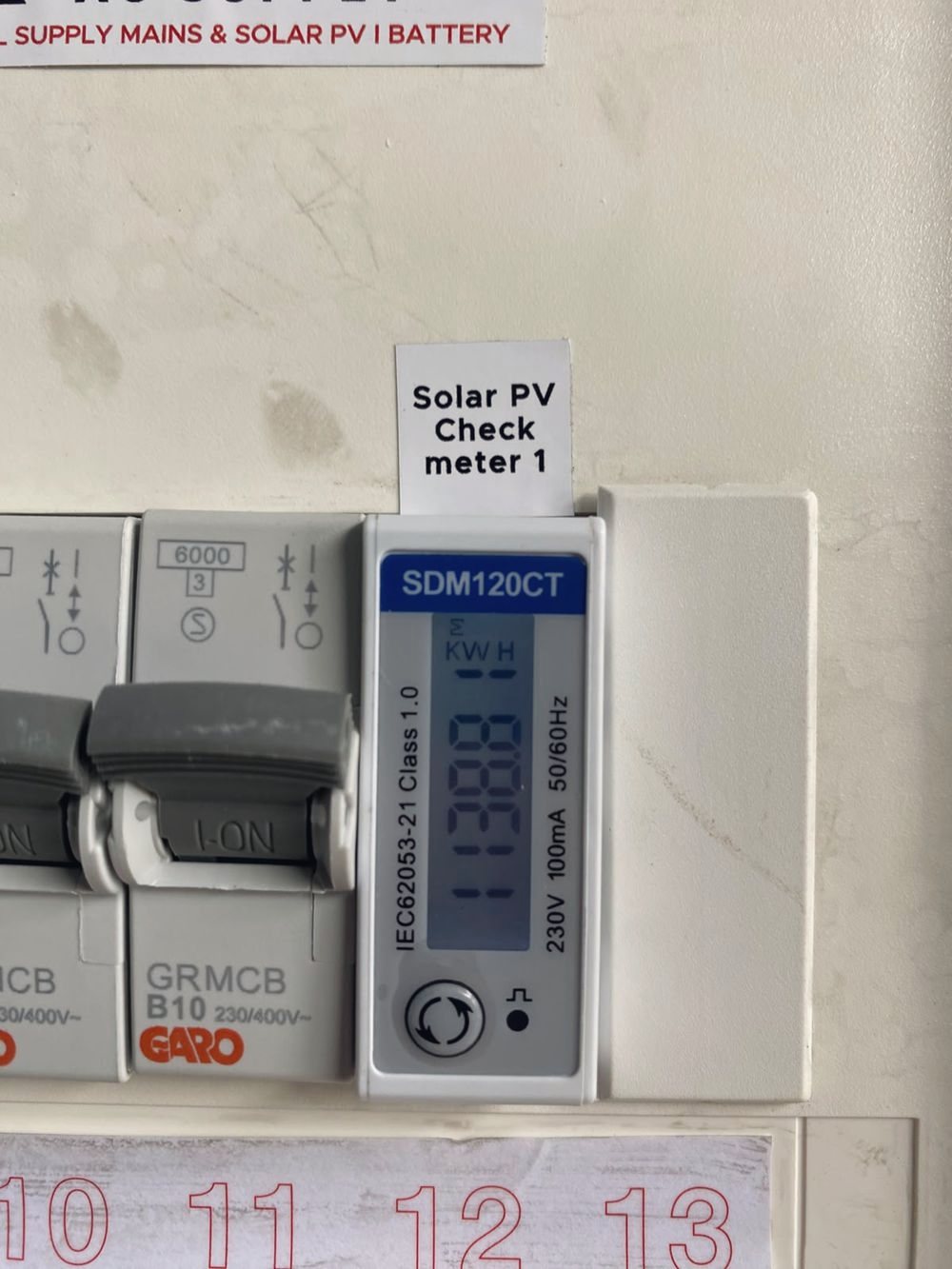 A solar PV check meter fitted beside the consumer unit